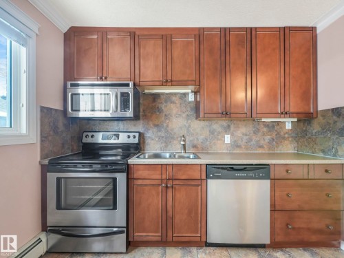 9 10724 115 Street, Edmonton, AB - Indoor Photo Showing Kitchen With Stainless Steel Kitchen