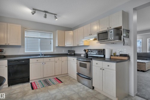 130 Campbell Road, Leduc, AB - Indoor Photo Showing Kitchen With Double Sink