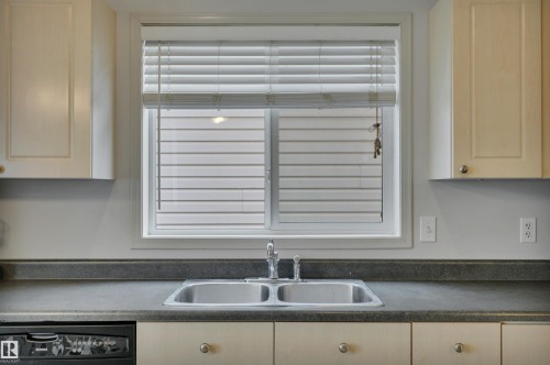 130 Campbell Road, Leduc, AB - Indoor Photo Showing Kitchen With Double Sink
