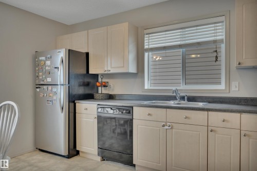130 Campbell Road, Leduc, AB - Indoor Photo Showing Kitchen With Double Sink