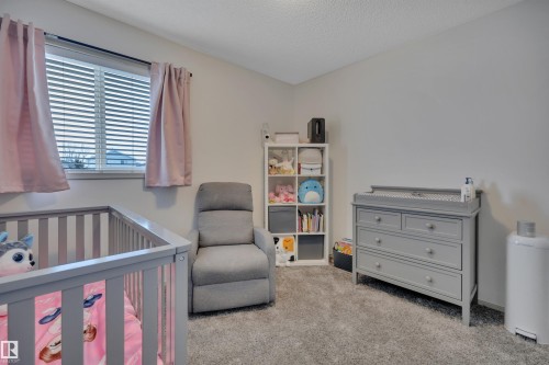 130 Campbell Road, Leduc, AB - Indoor Photo Showing Bedroom