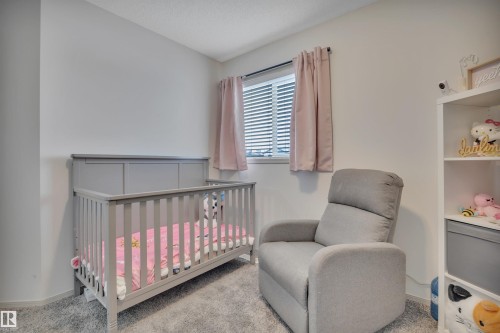 130 Campbell Road, Leduc, AB - Indoor Photo Showing Bedroom