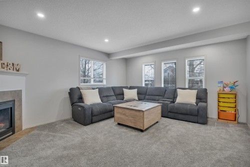 130 Campbell Road, Leduc, AB - Indoor Photo Showing Living Room With Fireplace