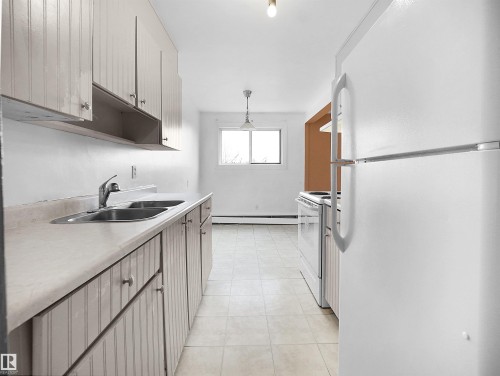 13 11265 31 Avenue, Edmonton, AB - Indoor Photo Showing Kitchen With Double Sink