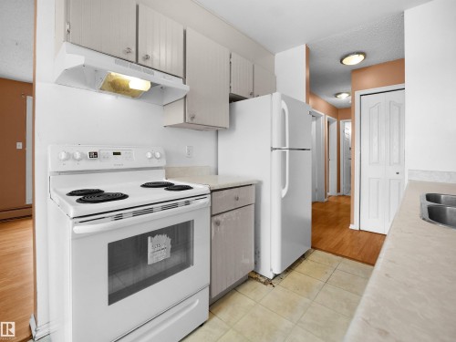 13 11265 31 Avenue, Edmonton, AB - Indoor Photo Showing Kitchen With Double Sink