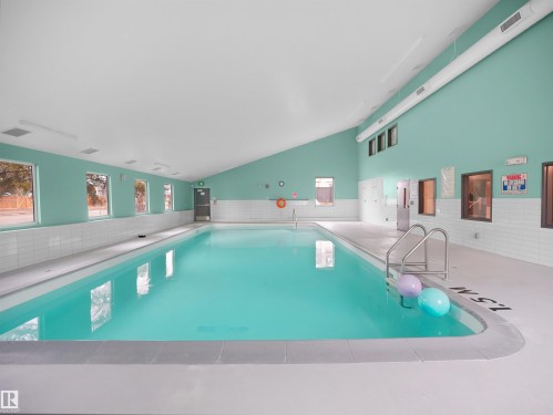 13 11265 31 Avenue, Edmonton, AB - Indoor Photo Showing Other Room With In Ground Pool