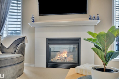 190 Keyport Circle, Leduc, AB - Indoor Photo Showing Living Room With Fireplace