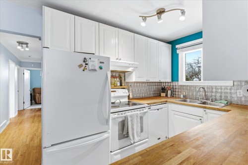 4315 105A Avenue, Edmonton, AB - Indoor Photo Showing Kitchen With Double Sink