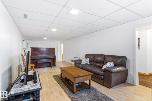 4315 105A Avenue, Edmonton, AB - Indoor Photo Showing Living Room With Fireplace
