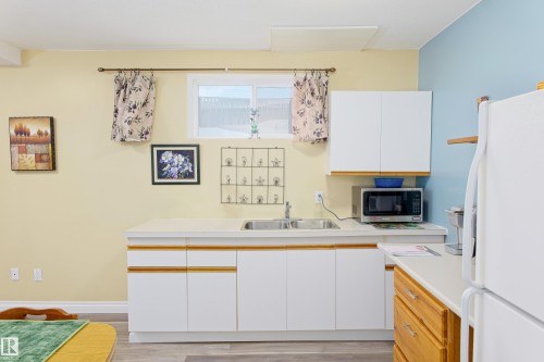 5238 43 Street, Barrhead, AB - Indoor Photo Showing Kitchen With Double Sink