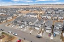 A clear aerial view showcasing the property within a structured residential neighborhood, featuring a paved street and surrounding homes - 3235 13 Avenue, Edmonton, AB  - Outdoor With View 