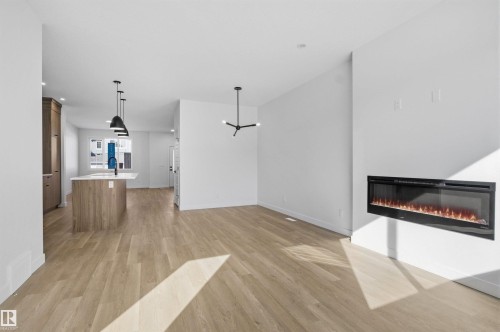 1227 Cristall Way, Edmonton, AB - Indoor Photo Showing Living Room With Fireplace