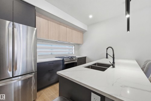 3 12204 121 Avenue, Edmonton, AB - Indoor Photo Showing Kitchen With Double Sink With Upgraded Kitchen