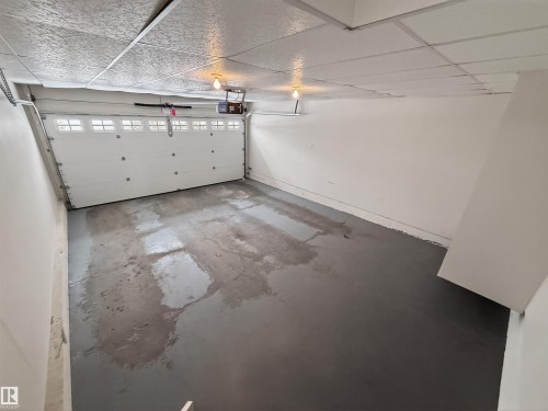 6 Briarwood Village, Stony Plain, AB - Indoor Photo Showing Garage