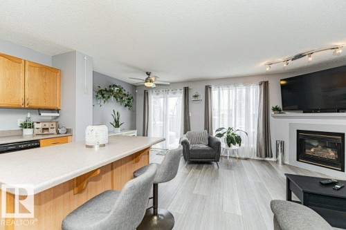 9136 166 Avenue, Edmonton, AB - Indoor Photo Showing Living Room With Fireplace