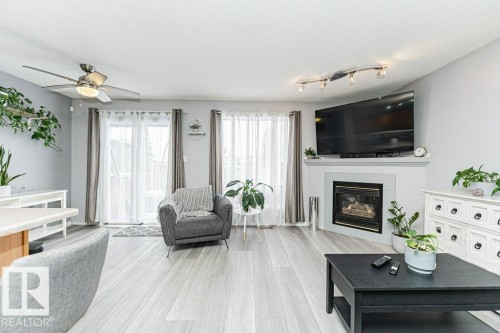 9136 166 Avenue, Edmonton, AB - Indoor Photo Showing Living Room With Fireplace