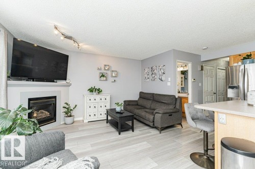 9136 166 Avenue, Edmonton, AB - Indoor Photo Showing Living Room With Fireplace