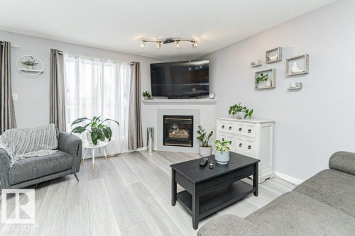 9136 166 Avenue, Edmonton, AB - Indoor Photo Showing Living Room With Fireplace