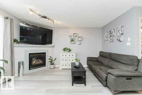 9136 166 Avenue, Edmonton, AB - Indoor Photo Showing Living Room With Fireplace