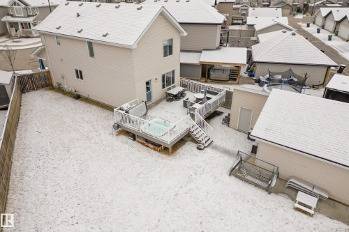 This property features a two-story home with light-colored siding and a matching roof - 635 41 Avenue, Edmonton, AB - Outdoor