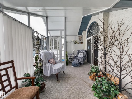 The property features a sunroom with a transparent roof and walls, offering abundant natural light - 7 85 Gervais Road, St. Albert, AB -  Photo Showing Other Room