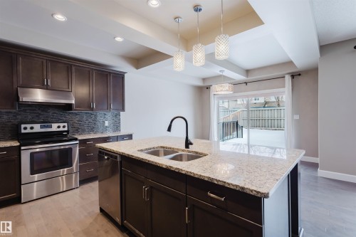 1957 Ainslie Link, Edmonton, AB - Indoor Photo Showing Kitchen With Double Sink With Upgraded Kitchen