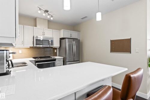 404 2755 109 Street, Edmonton, AB - Indoor Photo Showing Kitchen With Stainless Steel Kitchen With Double Sink With Upgraded Kitchen