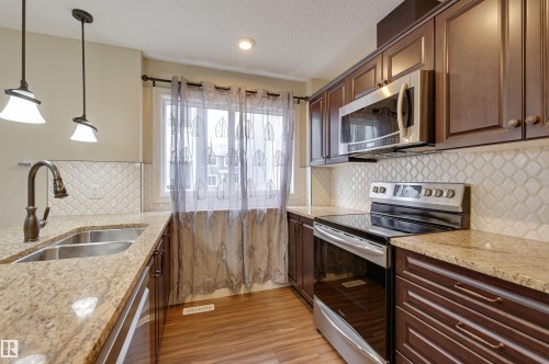 57 330 Bulyea Road, Edmonton, AB - Indoor Photo Showing Kitchen With Stainless Steel Kitchen With Double Sink With Upgraded Kitchen