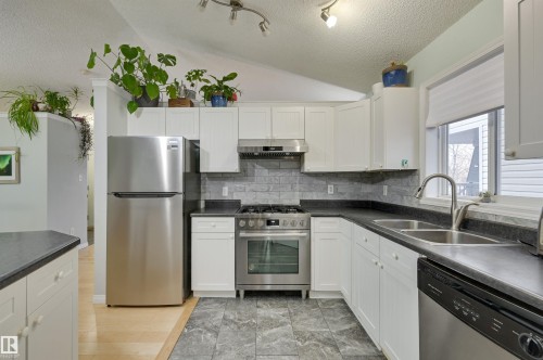 5811 Sutter Place, Edmonton, AB - Indoor Photo Showing Kitchen With Stainless Steel Kitchen With Double Sink