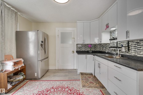 7449 83 Avenue, Edmonton, AB - Indoor Photo Showing Kitchen With Double Sink