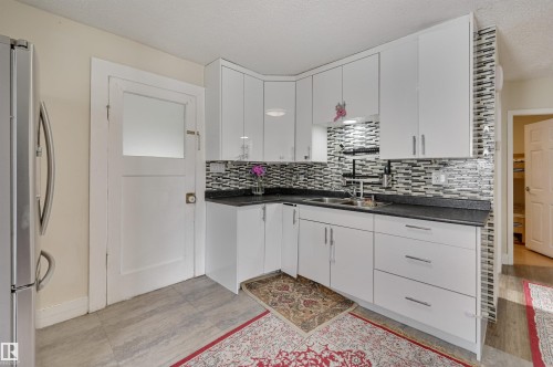 7449 83 Avenue, Edmonton, AB - Indoor Photo Showing Kitchen With Double Sink
