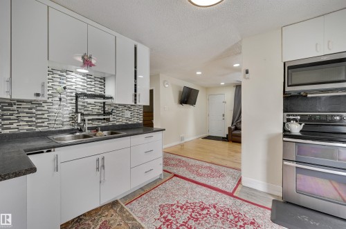 7449 83 Avenue, Edmonton, AB - Indoor Photo Showing Kitchen With Double Sink