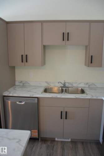 B 4313 54 Avenue, Barrhead, AB - Indoor Photo Showing Kitchen With Double Sink