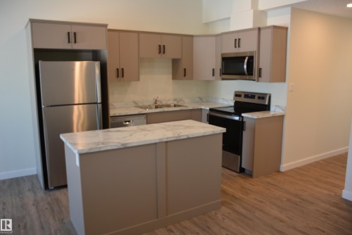 B 4313 54 Avenue, Barrhead, AB - Indoor Photo Showing Kitchen With Double Sink