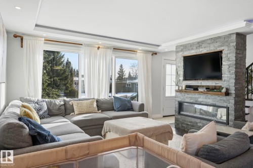 15702 86 Avenue, Edmonton, AB - Indoor Photo Showing Living Room With Fireplace