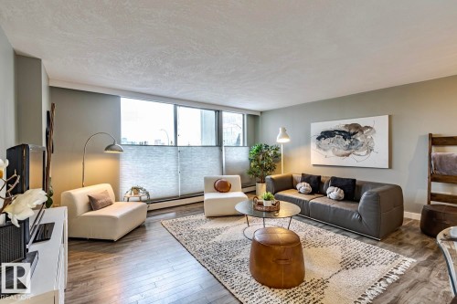 105 10883 Saskatchewan Drive, Edmonton, AB - Indoor Photo Showing Living Room
