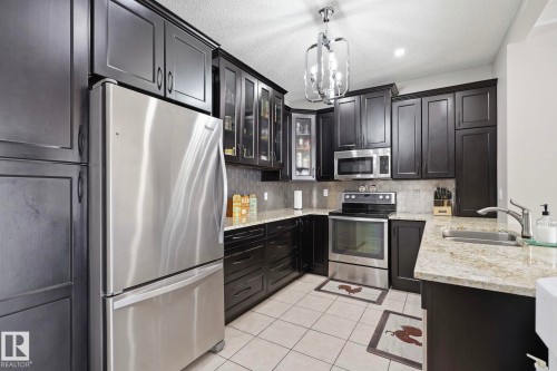 334 15499 Castle Downs Road, Edmonton, AB - Indoor Photo Showing Kitchen With Double Sink With Upgraded Kitchen