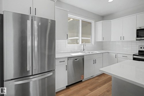 21203 25 Avenue, Edmonton, AB - Indoor Photo Showing Kitchen With Upgraded Kitchen