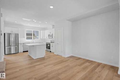 21203 25 Avenue, Edmonton, AB - Indoor Photo Showing Kitchen With Upgraded Kitchen