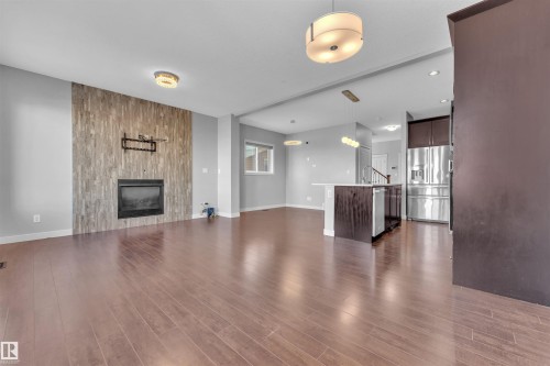 6664 Cardinal Road, Edmonton, AB - Indoor Photo Showing Living Room With Fireplace