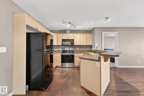 414 13710 150 Avenue, Edmonton, AB - Indoor Photo Showing Kitchen With Double Sink
