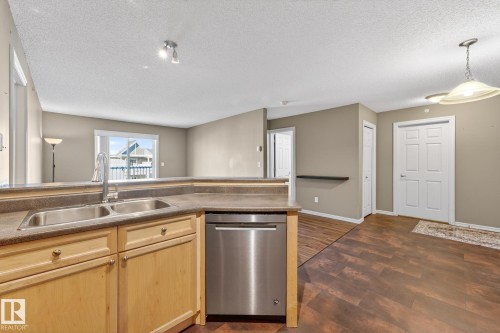 414 13710 150 Avenue, Edmonton, AB - Indoor Photo Showing Kitchen With Double Sink