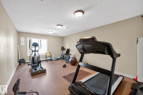 414 13710 150 Avenue, Edmonton, AB - Indoor Photo Showing Gym Room