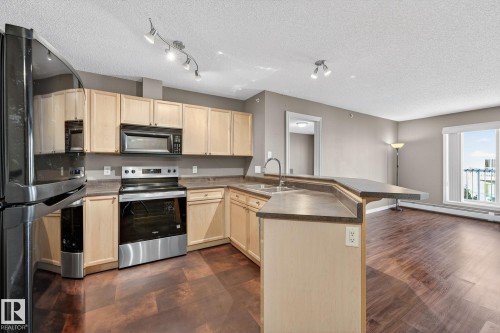 414 13710 150 Avenue, Edmonton, AB - Indoor Photo Showing Kitchen With Double Sink