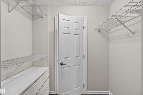 leading to the Cheater Door to the Main Bathroom - 106 4403 23 Street Nw, Edmonton, AB - Indoor With Storage