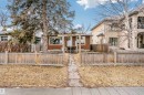The property features a front yard with a wooden fence and a stone path leading to the entrance - 6524 112 Street, Edmonton, AB  - Outdoor 