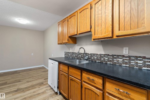 407 3610 43 Avenue, Edmonton, AB - Indoor Photo Showing Kitchen With Double Sink