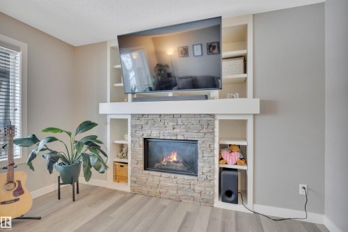 17626 61A Street, Edmonton, AB - Indoor Photo Showing Living Room With Fireplace