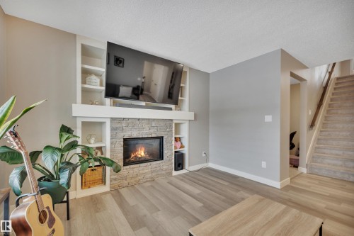 17626 61A Street, Edmonton, AB - Indoor Photo Showing Living Room With Fireplace