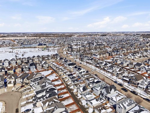 Overhead view of a developed community featuring various residential properties, roads, and open spaces - 678 Secord Boulevard, Edmonton, AB - Outdoor With View